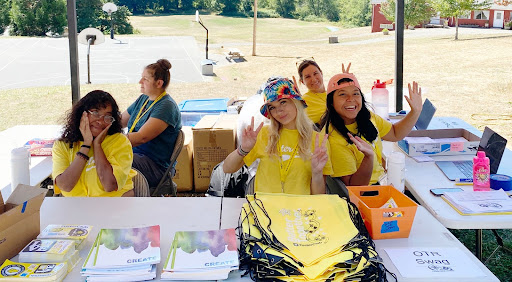 OTR Check in AllStar Interns and FosterClub staff at Oregon Teen Retreat OTR registration table at Camp Cedar Ridge in Vernonia, Oregon.